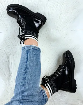 Bottines noires vernies effet chaussettes à imprimés aztèques